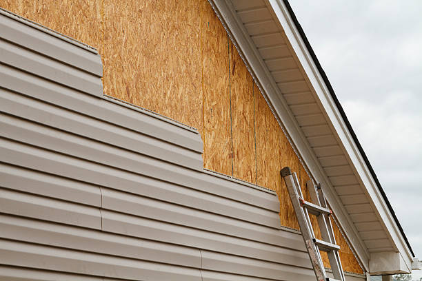 Professional Siding technician working in Coulters, PA